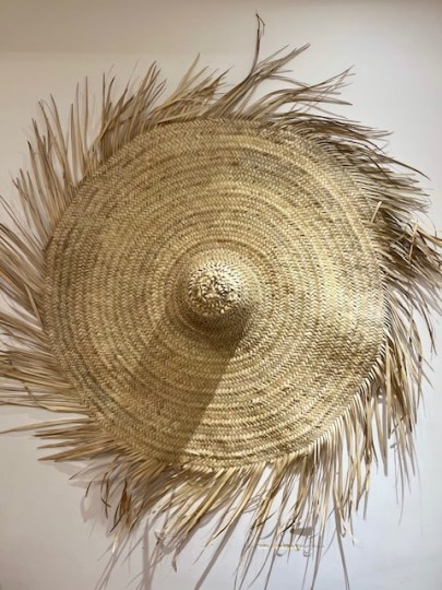 Chapeau mural à franges en feuille de palmier